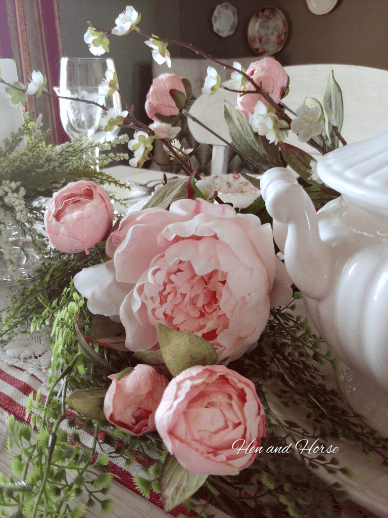 pink peonies on dining room table