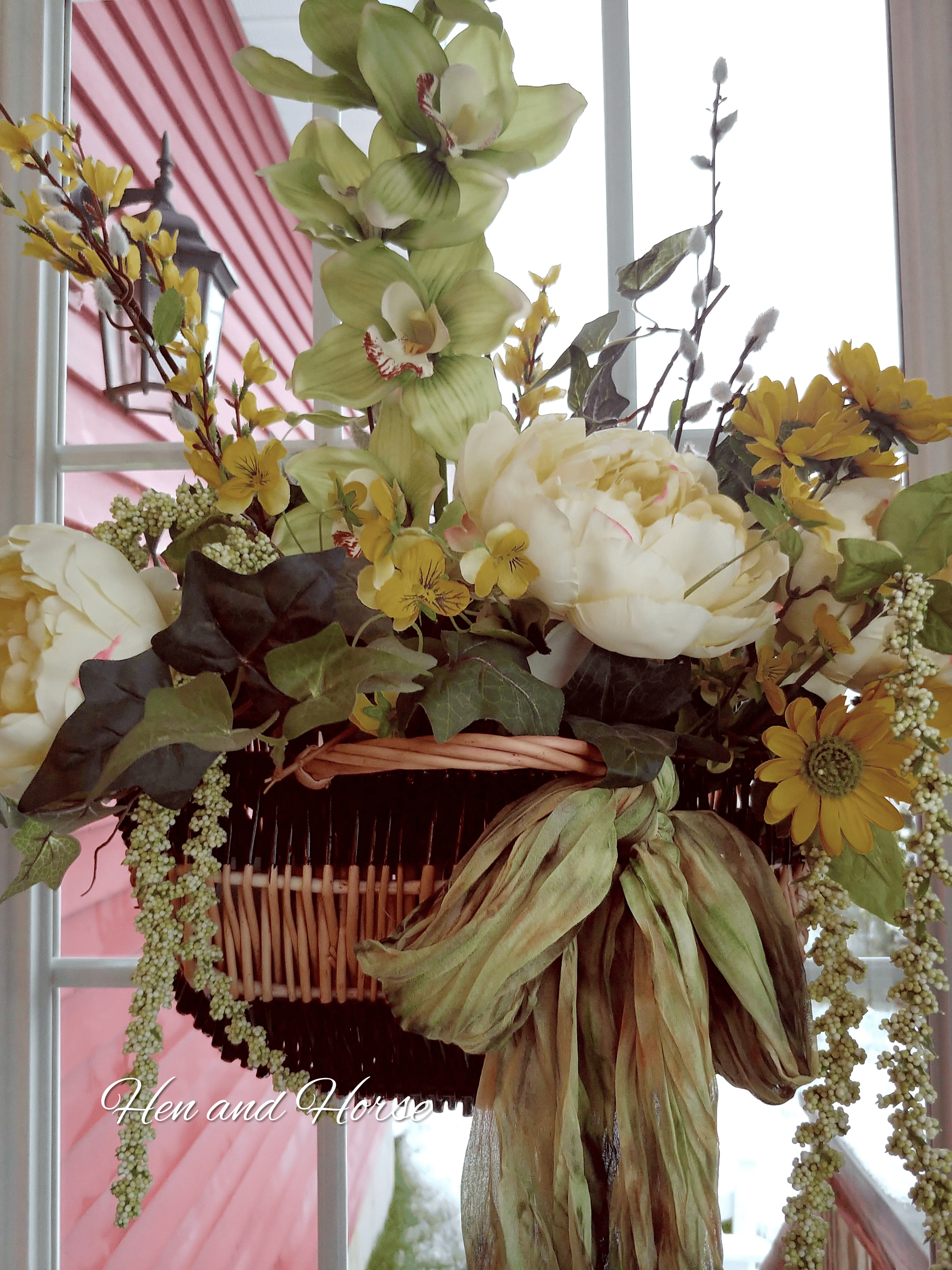 How to Freshen Up Your Front Door with a New Floral Basket Arrangement