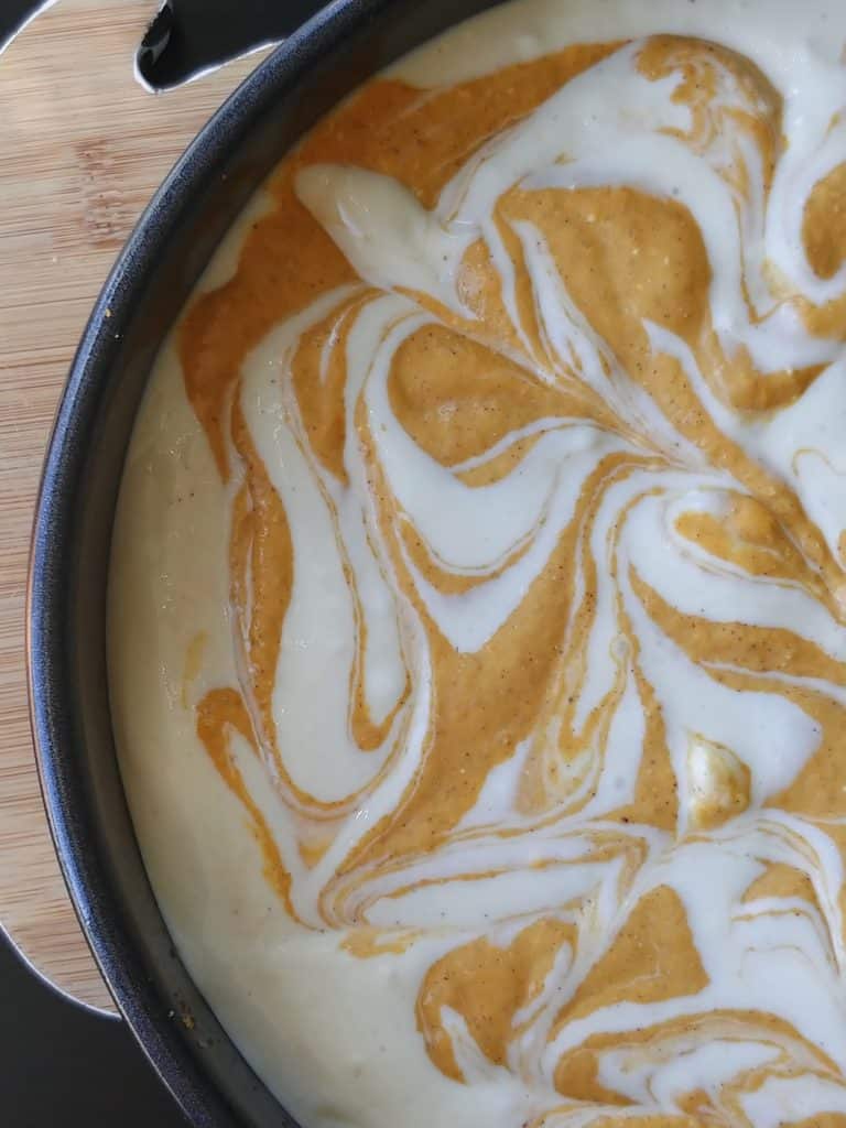 pumpkin swirl cheesecake ready to go into oven