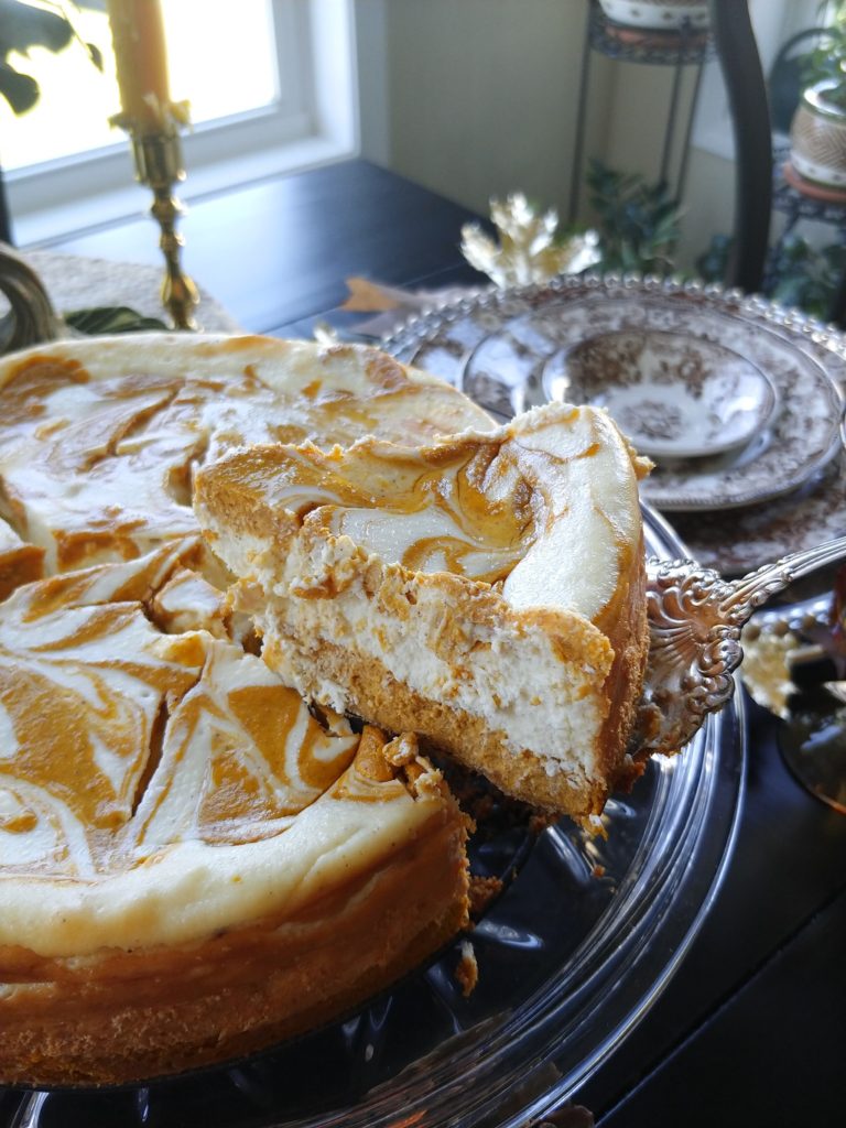 a slice of pumpkin swirl cheesecake