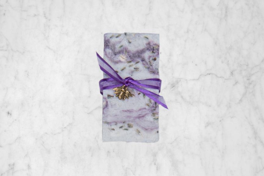 lavender soap with ribbon around it