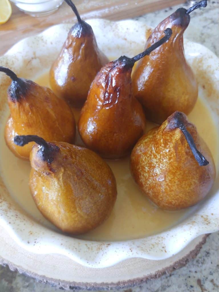 A close up of baked pears