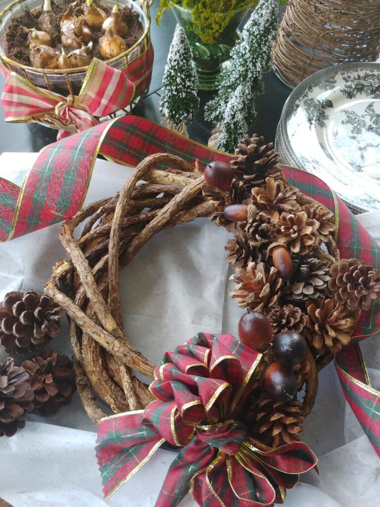 grapevine wreath with pinecones