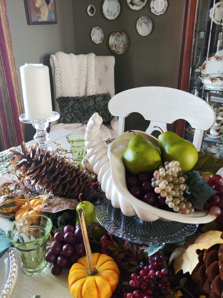 A table topped with different types of food on a plate, with Thanksgiving and Fruit