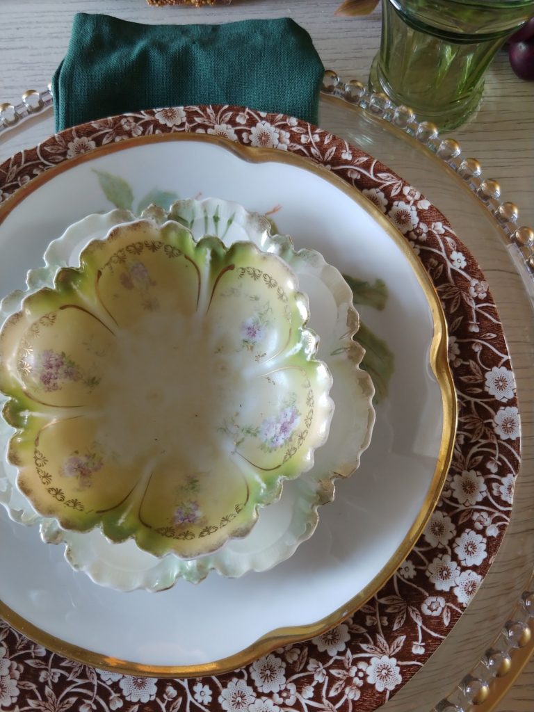 vintage berry bowl on top of dish stack