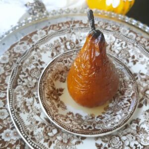 baked pear on vintage brown transferware dish