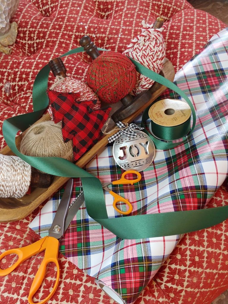 a dough bowl with spools of yard