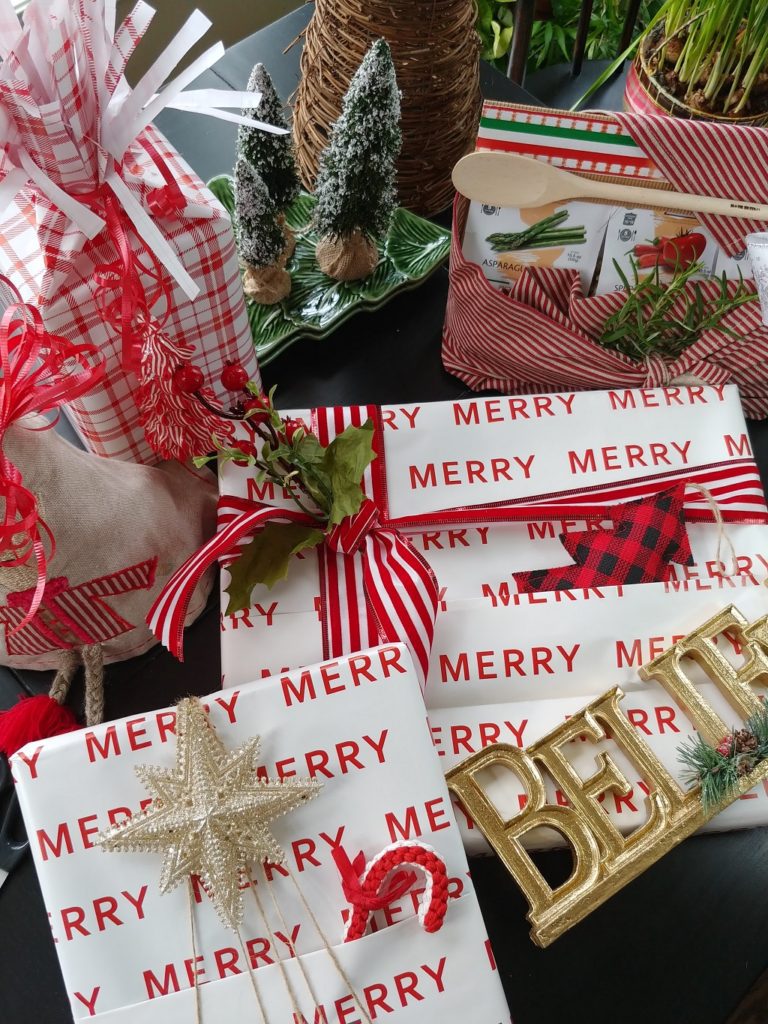 christmas presents wrapped in red and white paper