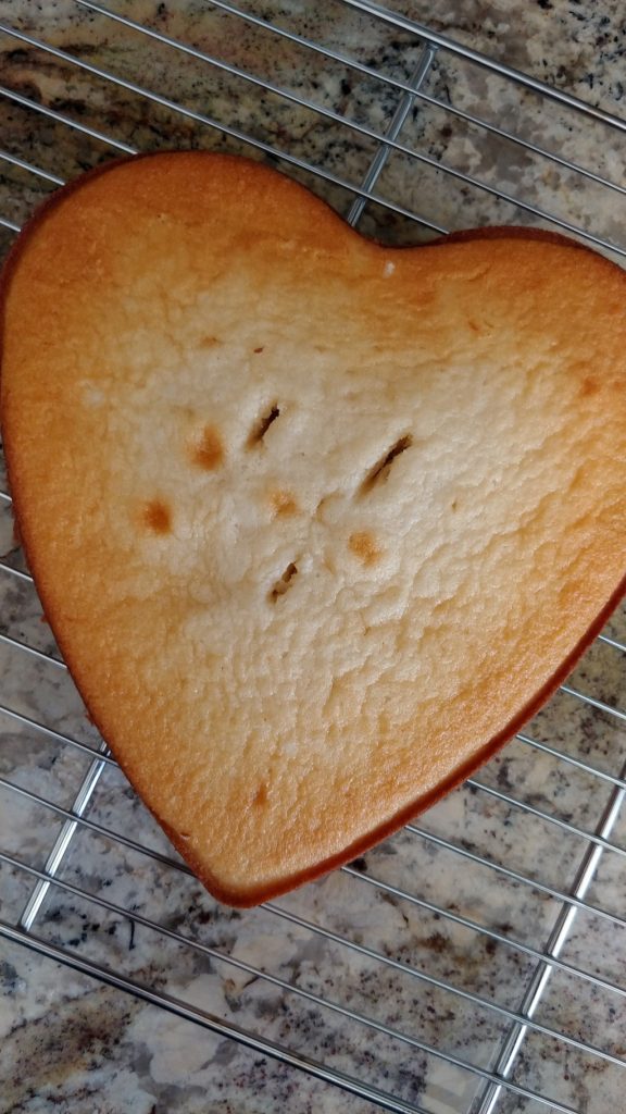 A heart-shaped cake out the oven