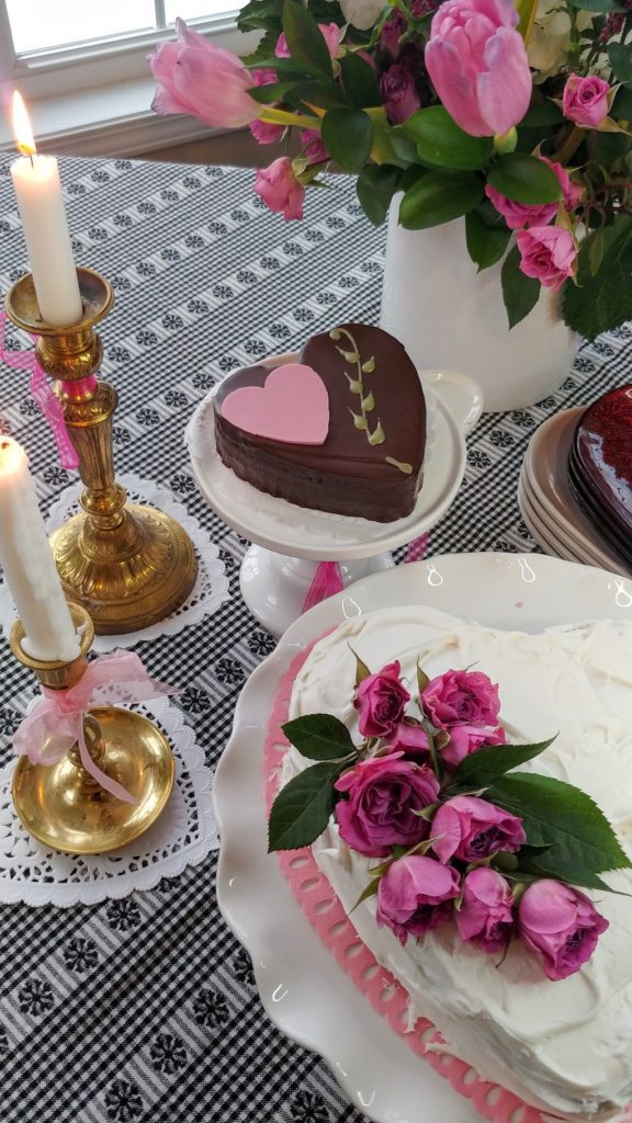 A heart cake with flowers on top