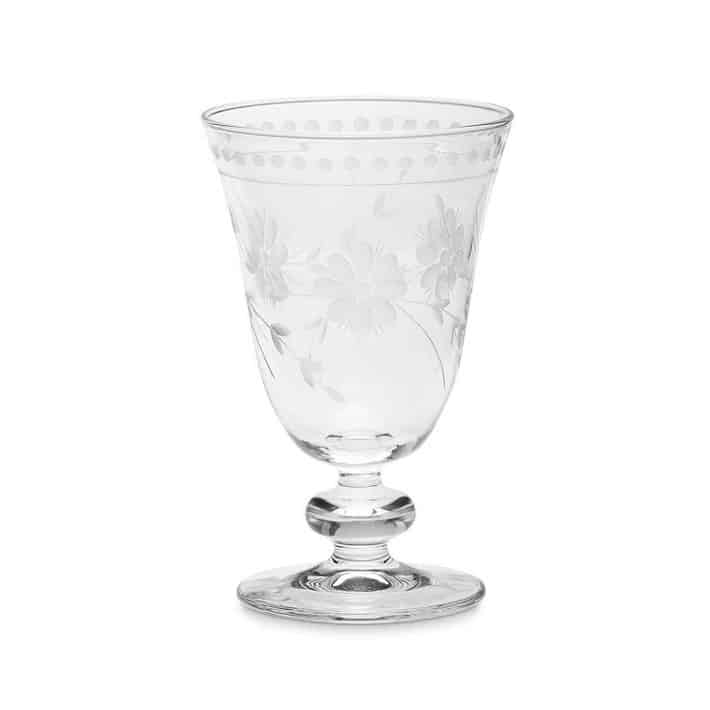 A wine glass with etching on it