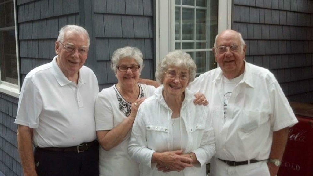 A group of people posing for the camera