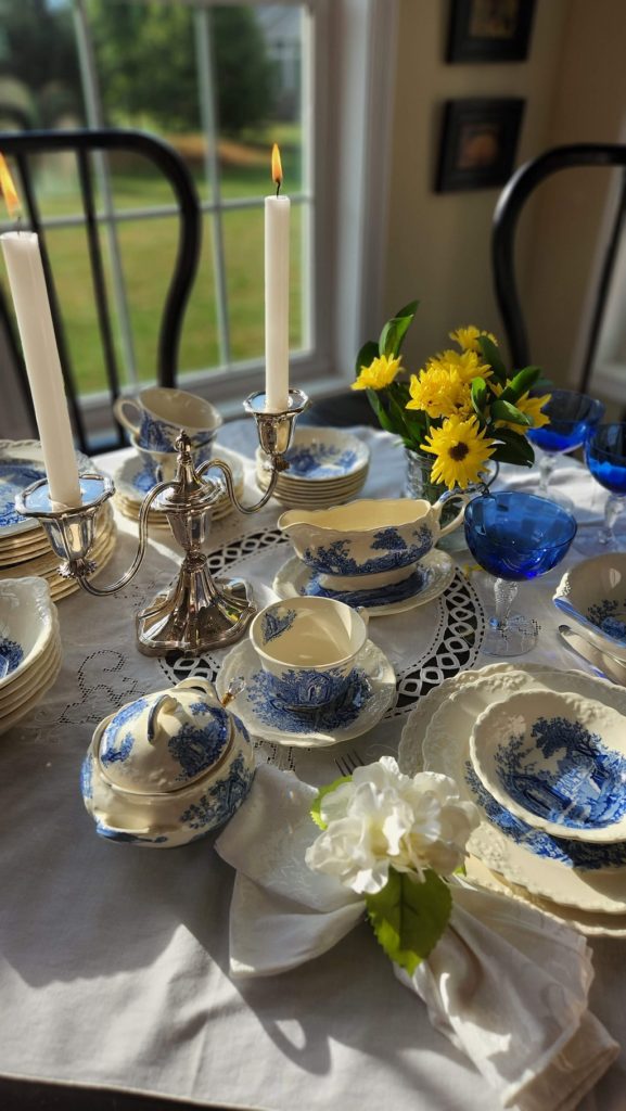 blue and white dishes on table