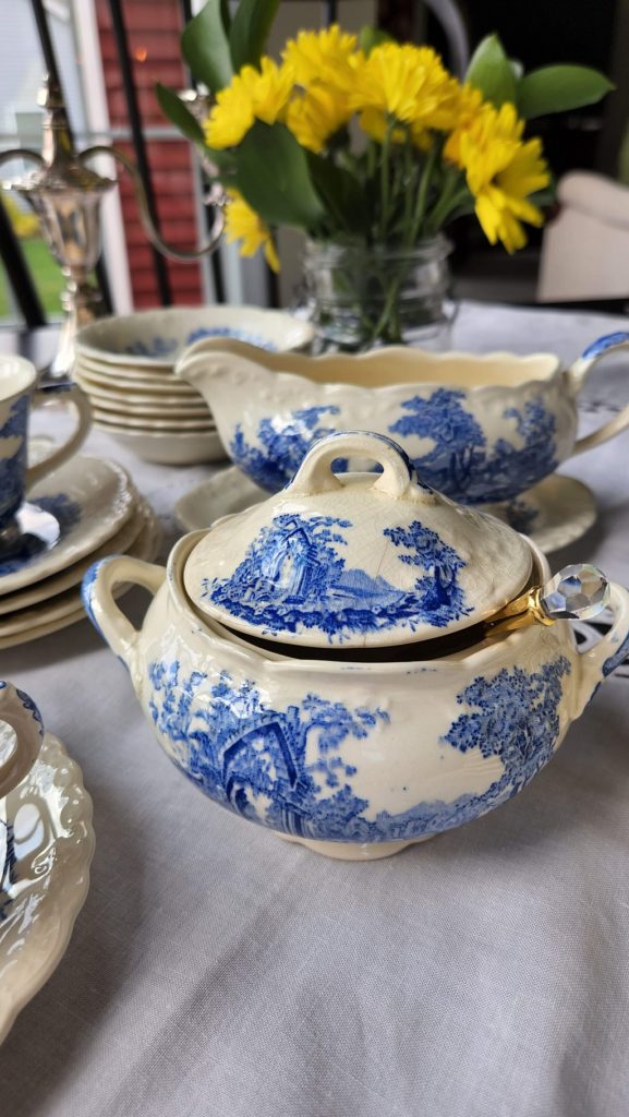 Yellow Daisies with blue sugar bowl