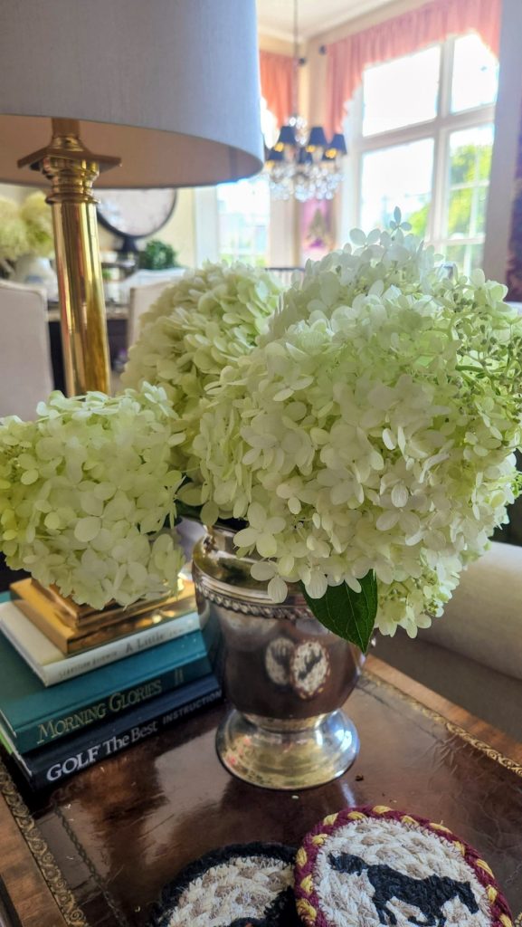 hydrangea bouquet in silver pitcher