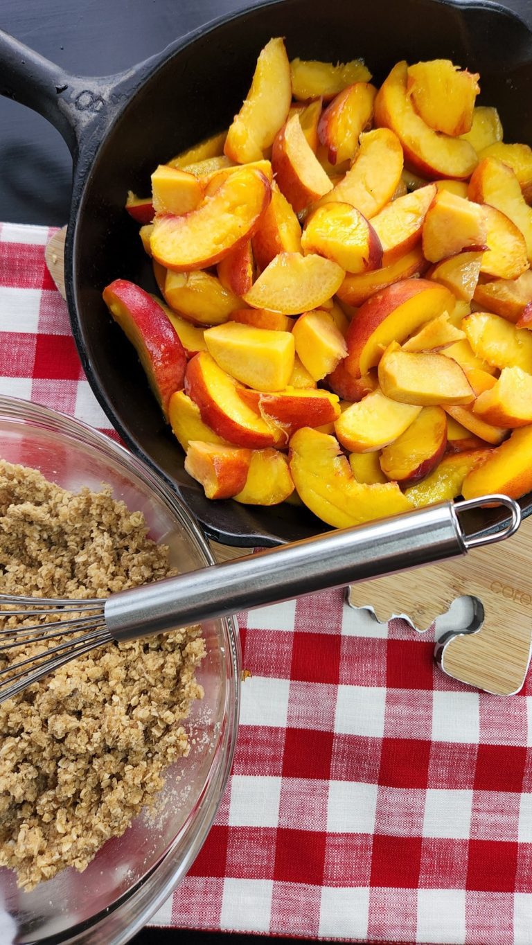 Sliced peaches in pan