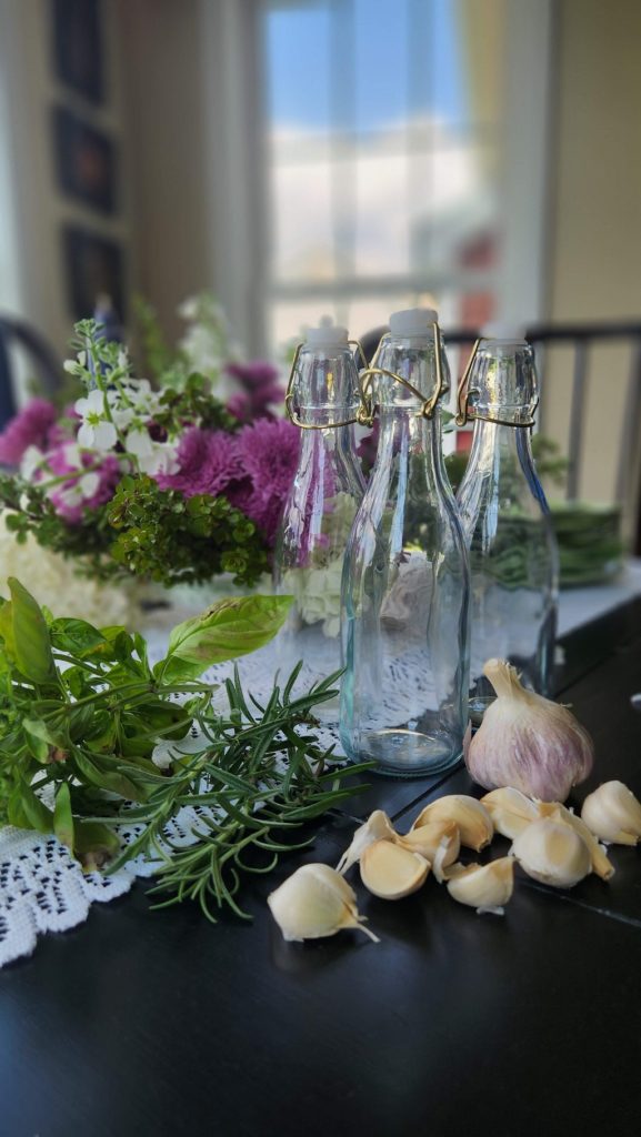 Empty bottle with herbs on table