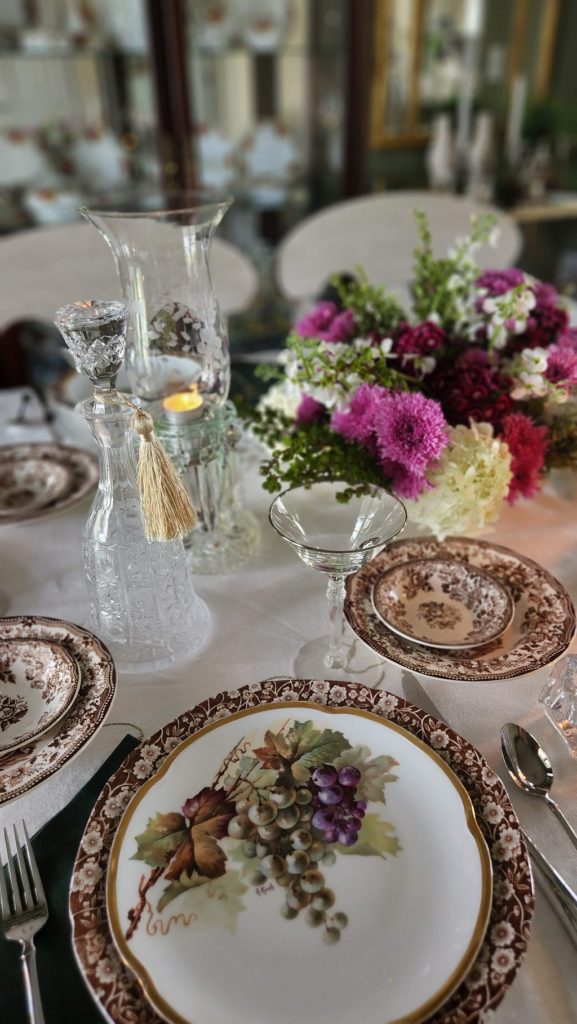 flowers and dining room table with dishes