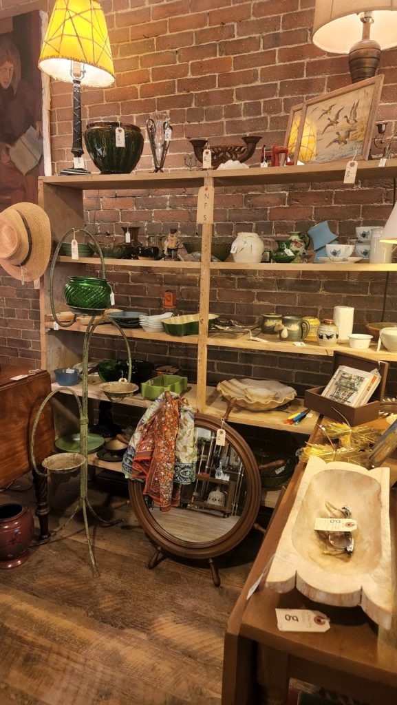 shelving in shop with antique on it