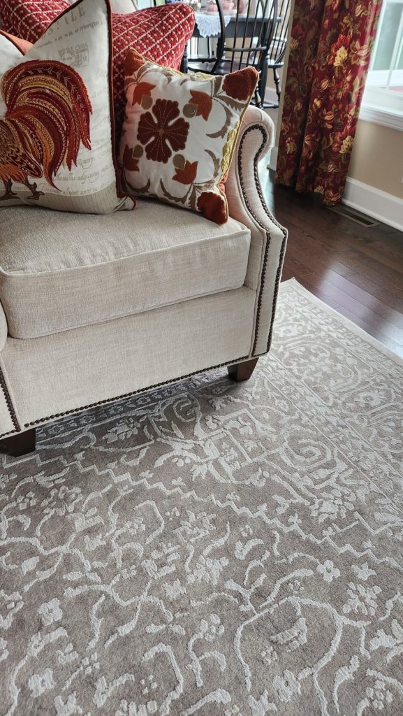 up close look at neutral rug on floor