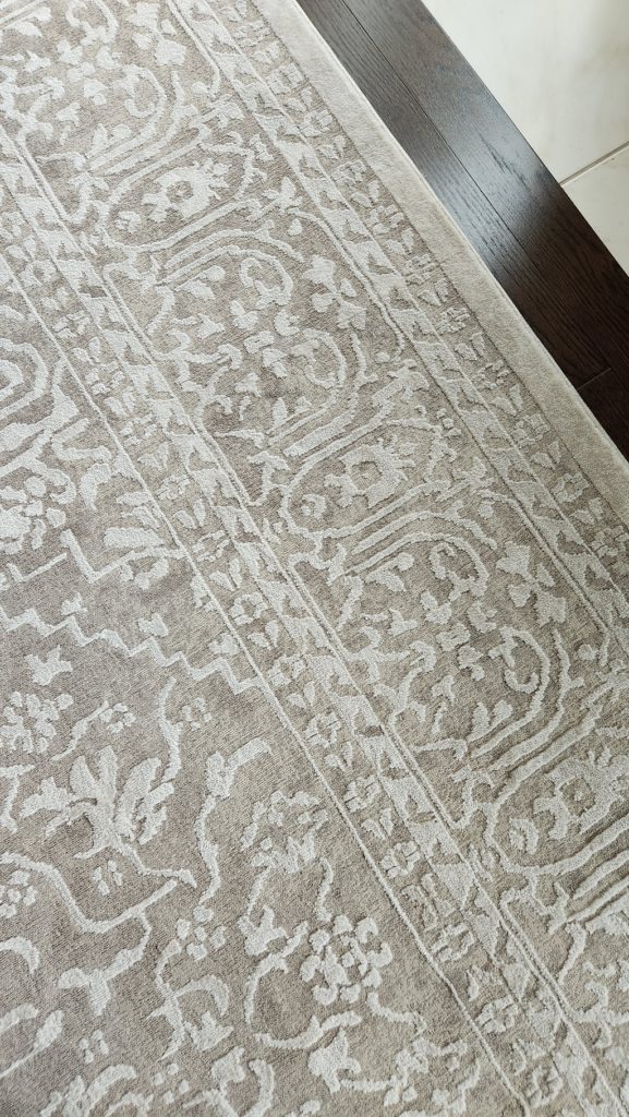 close up of netural rug on floor