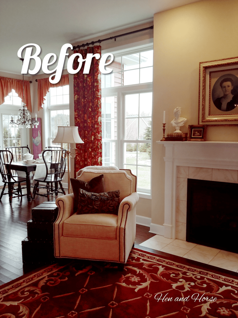 red rug and red draperies with chair