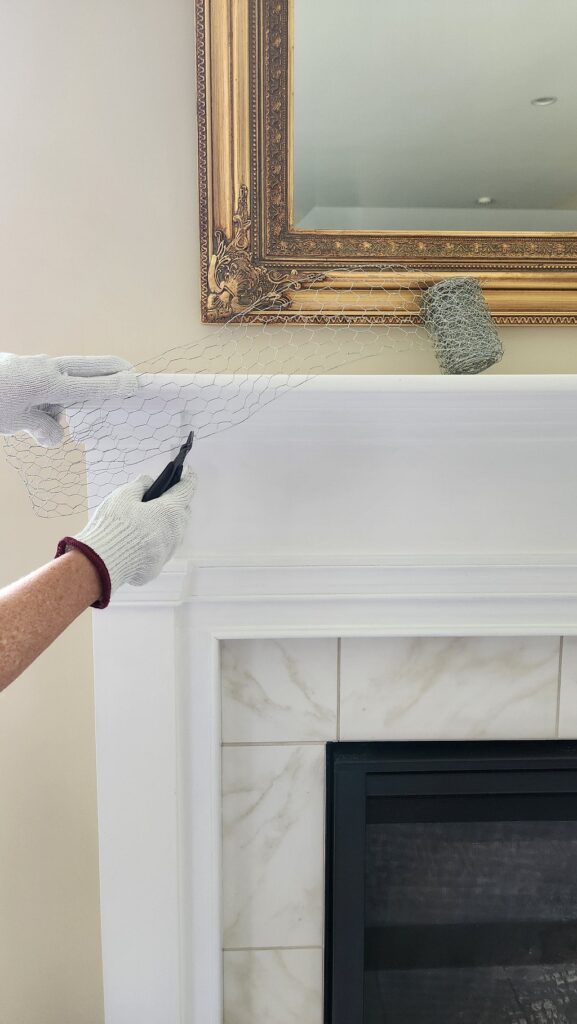 fireplace mantle with chicken wire prepping