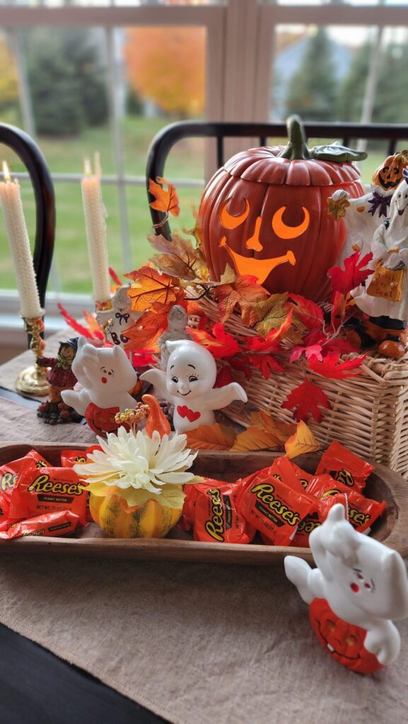 dough bowl with halloween decorations surrounding it