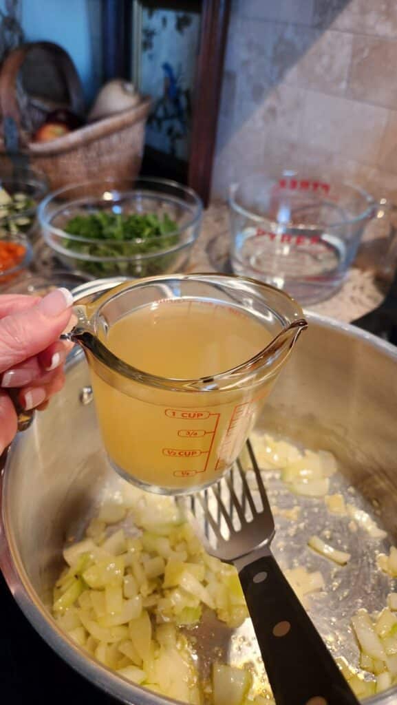 4 cups of water ready to pour into pot