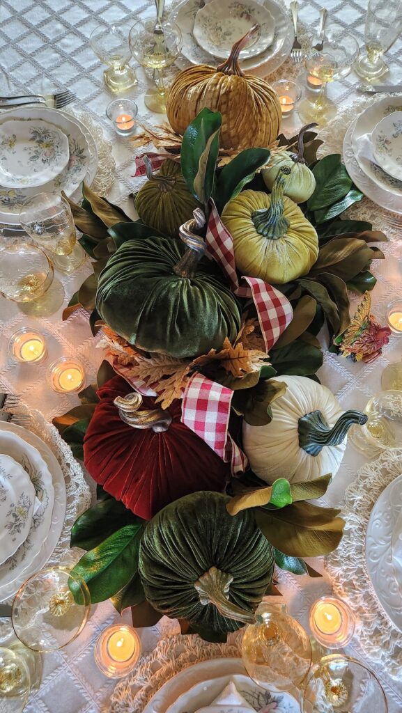 overhead view of velvet pumpkins on thanksgiving table