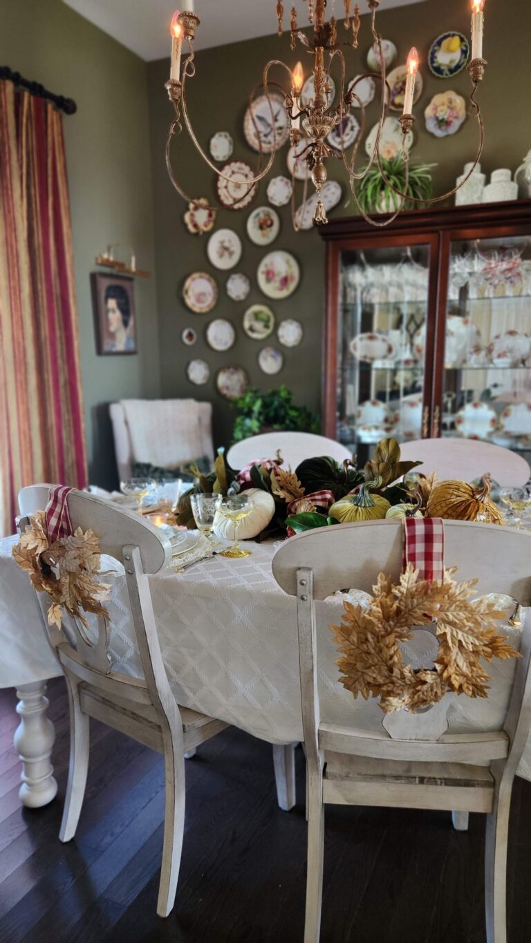 thanksgiving table with wreath hanging on chair