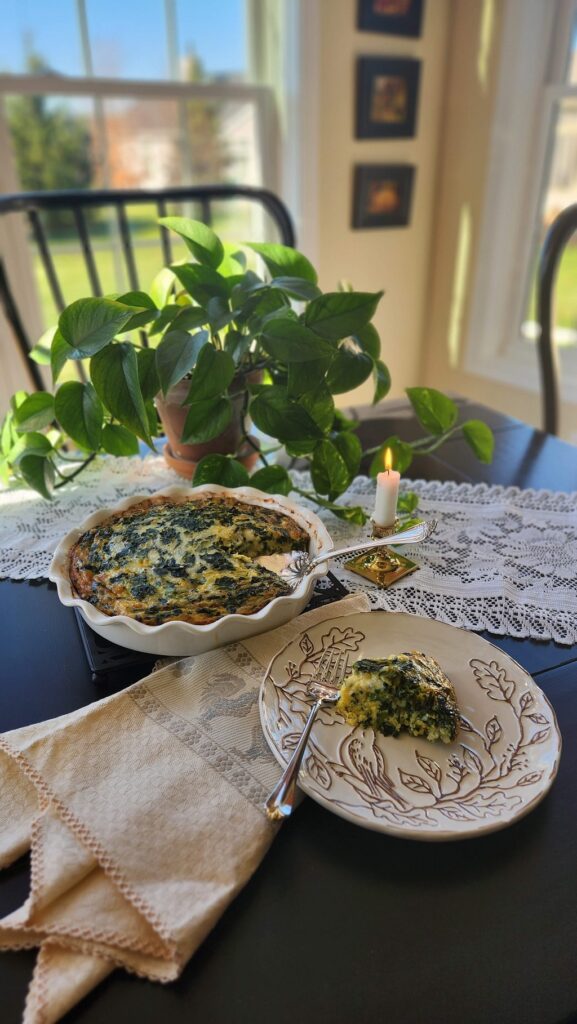 spinach quiche in pan ready to serve