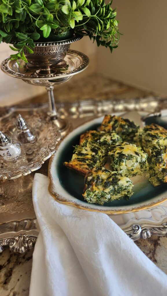 spinach quiche squares on pretty dish