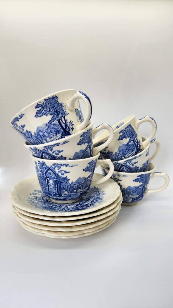 vintage blue and white cups and saucers stacked