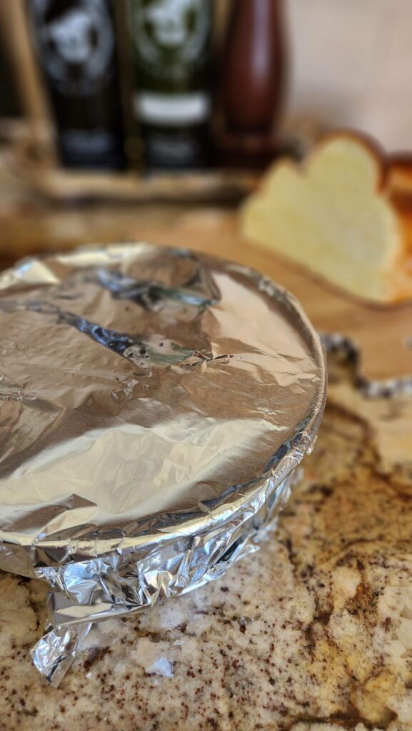tin foil on top of souffle dish ready to go into a crock pot