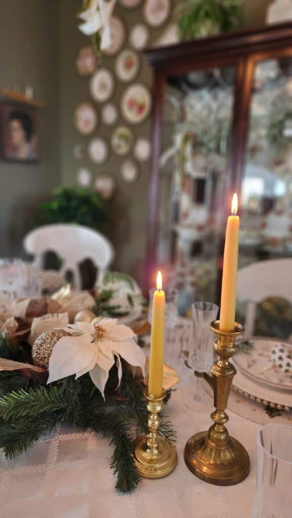 Christmas dinner table with candles on it
