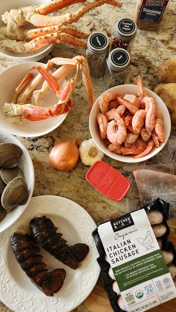 seafood in bowls on counter ready to make a seafood boil