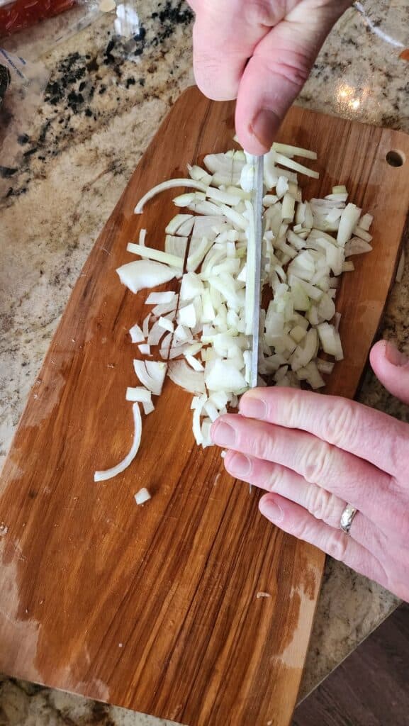 cutting board with chopped onions
