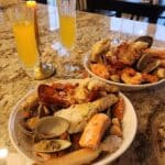seafood boil in two dishes on countertop