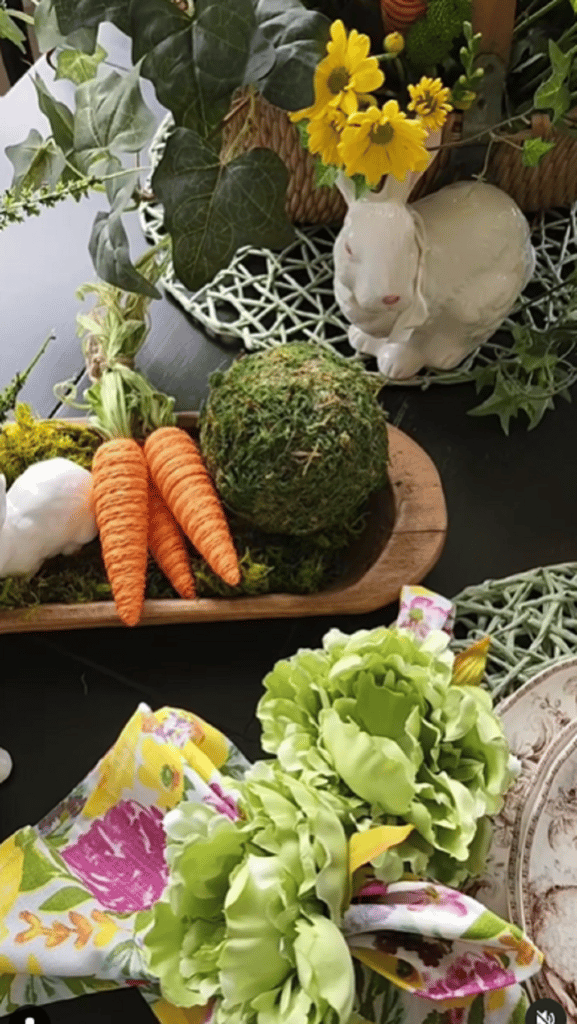 spring dough bowl with greenery and faux carrots for easter time