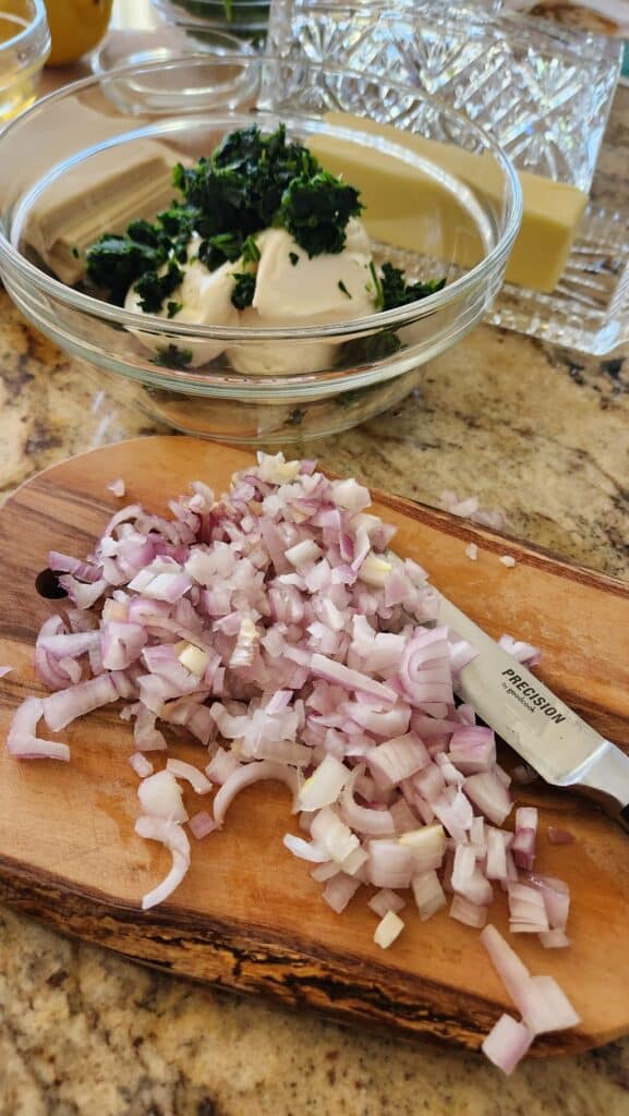 chopped shallot on a cutting board