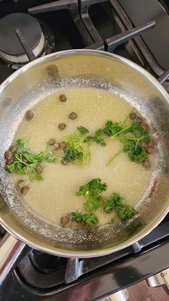warmed butter, capers and lemon juice in small frying pan