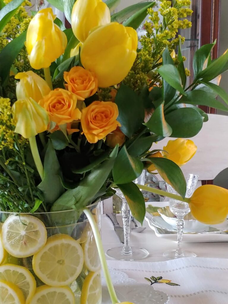 easter tablescapes ideas yellow flowers with lemons centerpiece