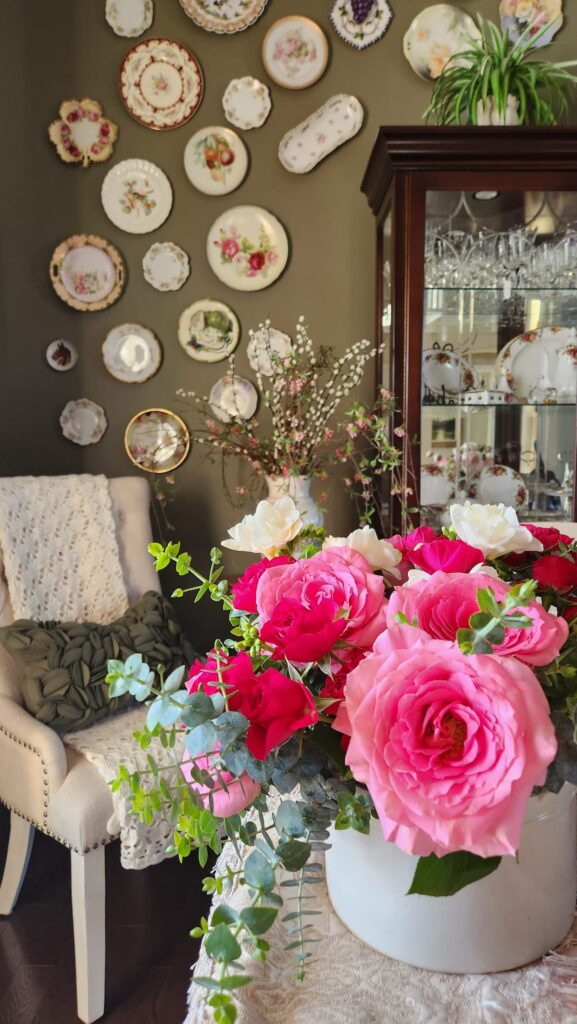 pink roses in  centerpiece on table for Easter tablescapes ideas