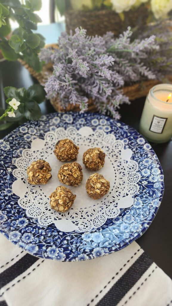 almond butter protein balls on white paper doily