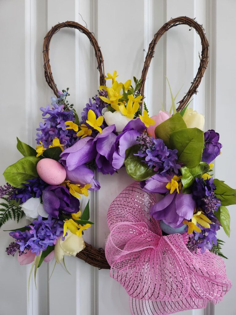 bunny wreath with faux florals on it