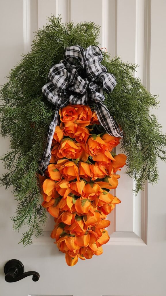 carrot wreath made from orange roses