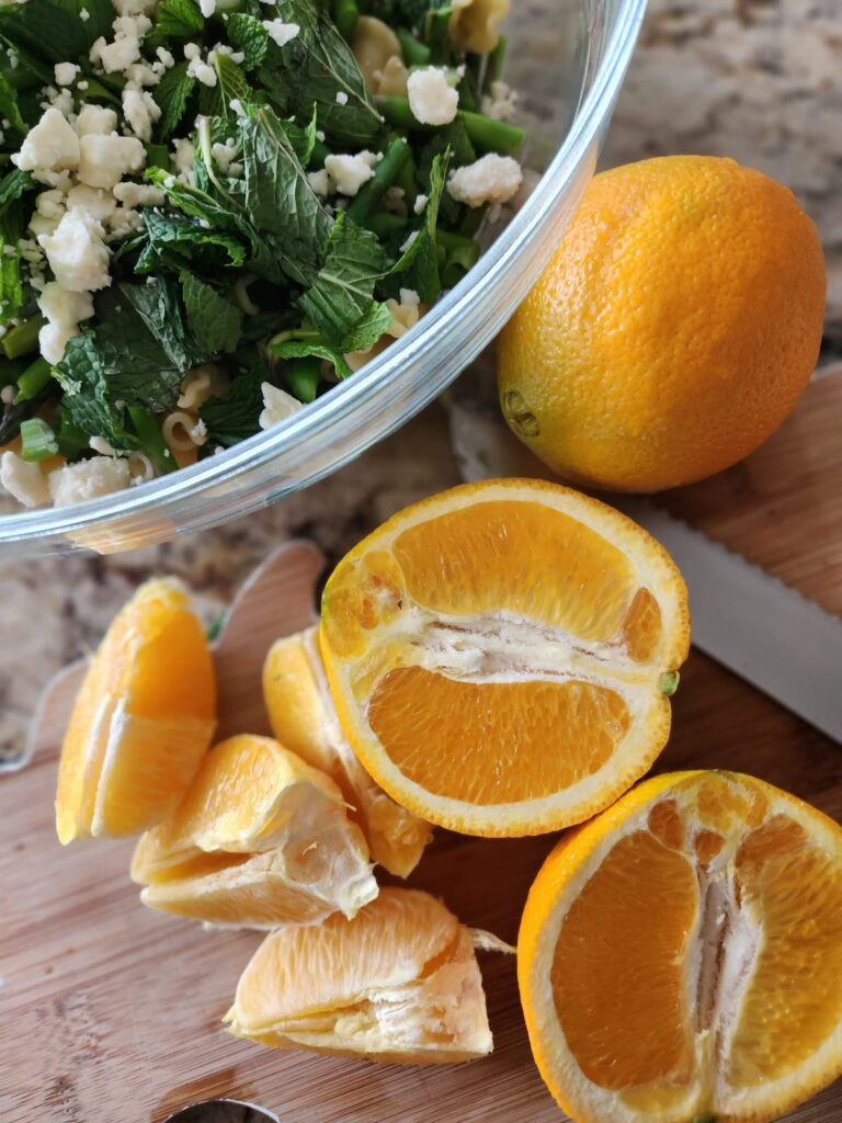 orange halves on cutting board