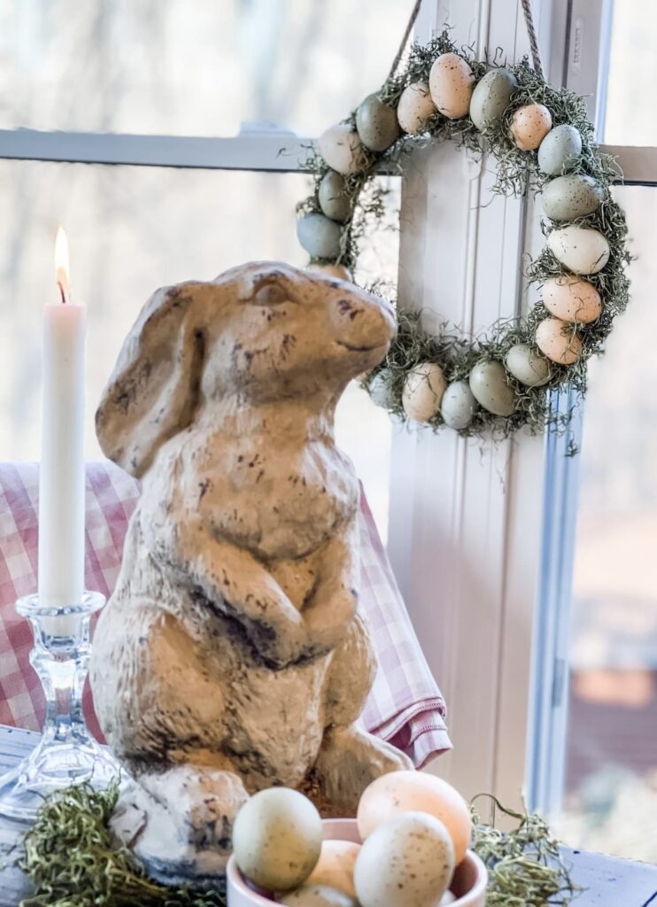 bunny with egg wreath hanging 