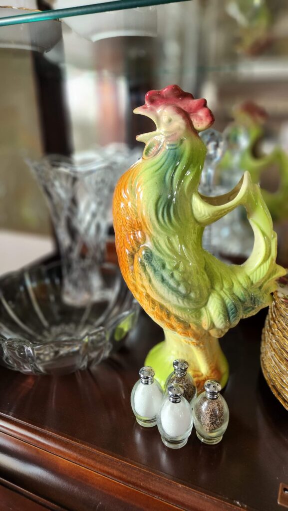 vintage rooster pitcher on shelf